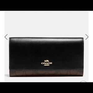 COACH trifold wallet in signature print